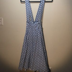 Cute polka dot skirt with suspenders.